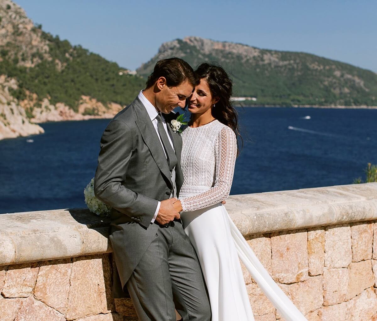 Rafal Nadal poses with wife Xisca Perello for the official wedding portraits