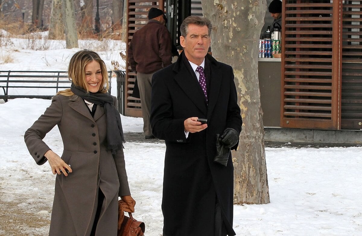 Sarah Jessica Parker walking alongside Pierce Brosnan on the set of 'I Don't Know How She Does It'.