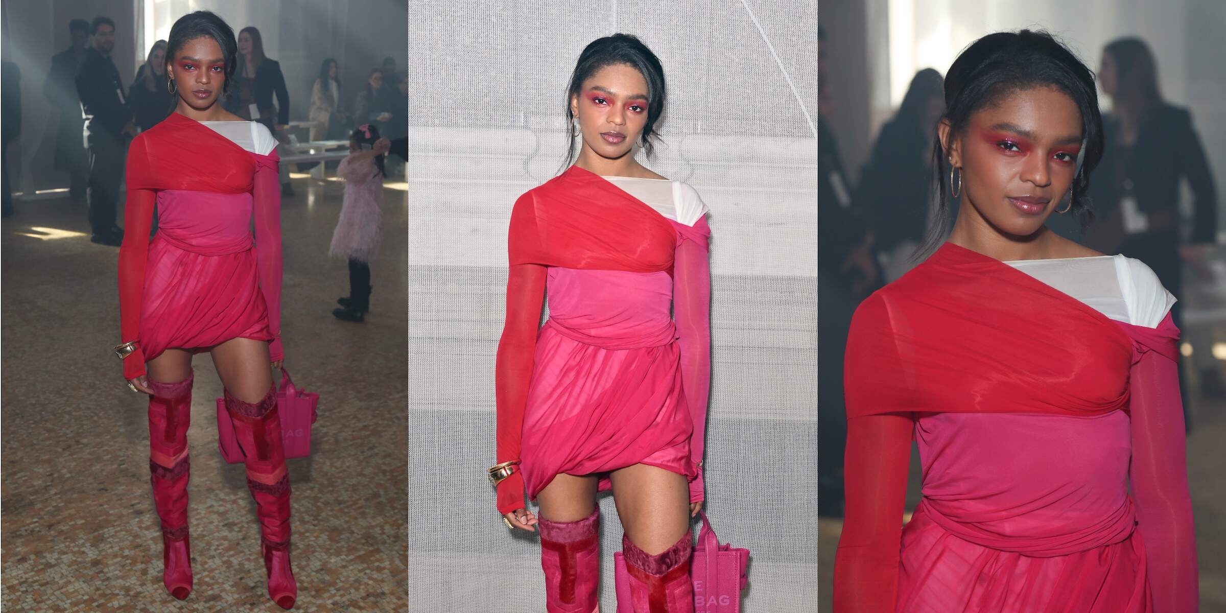 Wearing a hot pink dress, Selah Marley poses before the Helmut Lang fashion show