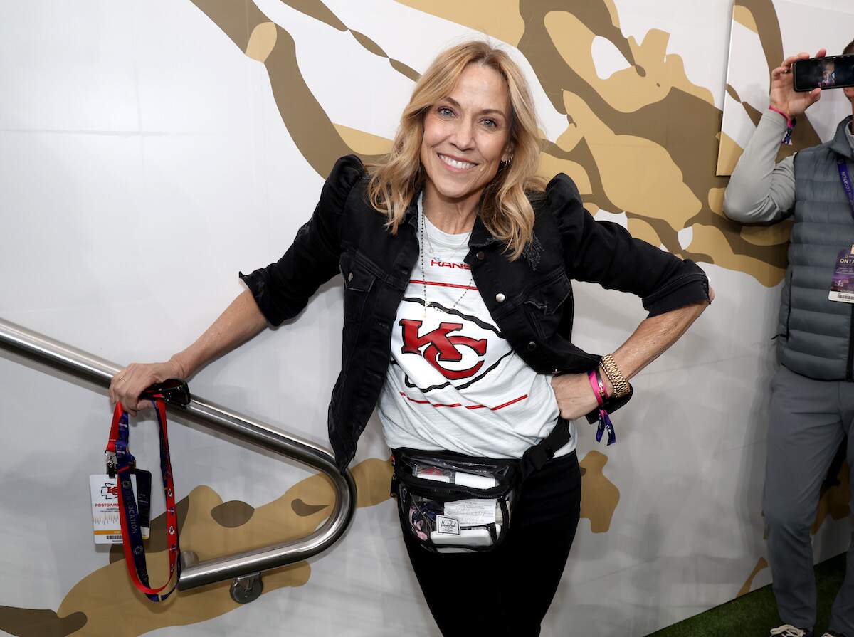 Chiefs fan Sheryl Crow smiles inside the stadium at Super Bowl LVIII