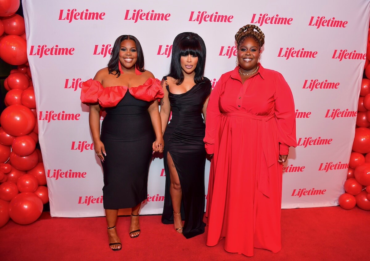 Amber Riley, K. Michelle, and Raven Goodwin pose on the red carpet at the 'Single Black Female 2' premiere