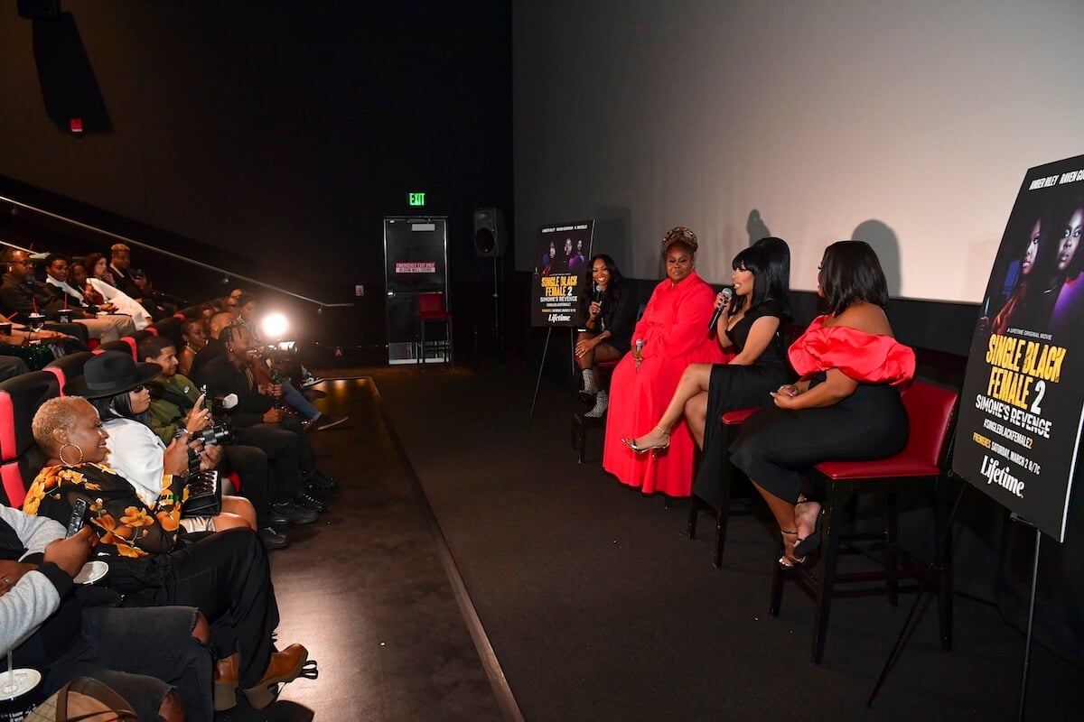 The cast of 'Single Black Female 2' on stage at the movie's premiere