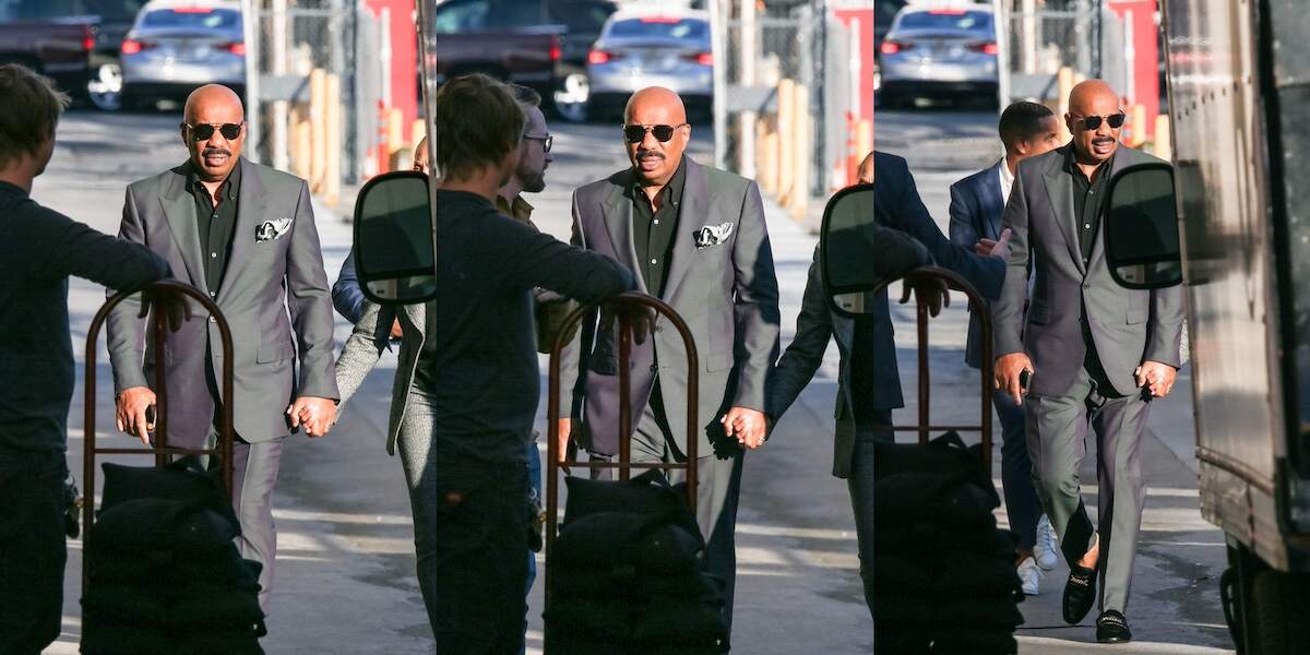 TV host Steve Harvey is seen arriving at 'Jimmy Kimmel Live' in a gray suit