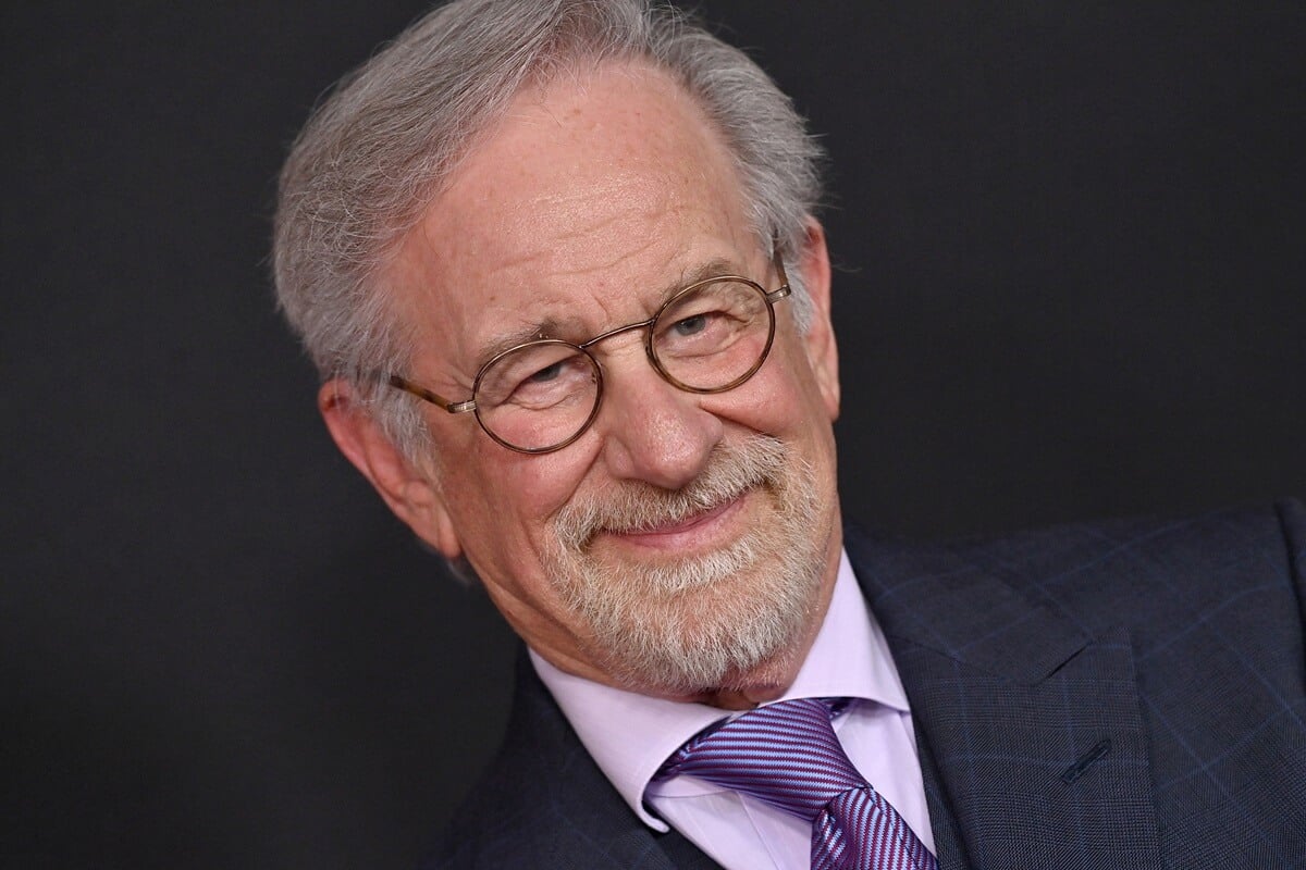 Steven Spielberg posing in a suit at the the Los Angeles Premiere of LucasFilms' "Indiana Jones and the Dial of Destiny".