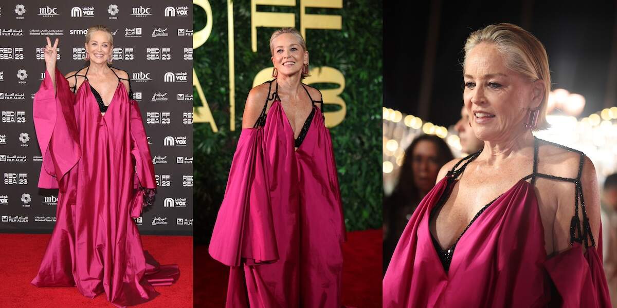 Actor Sharon Stone speaks to interviews in a pink gown at the Opening Night screening of "HWJN" at the Red Sea International Film Festival 2023