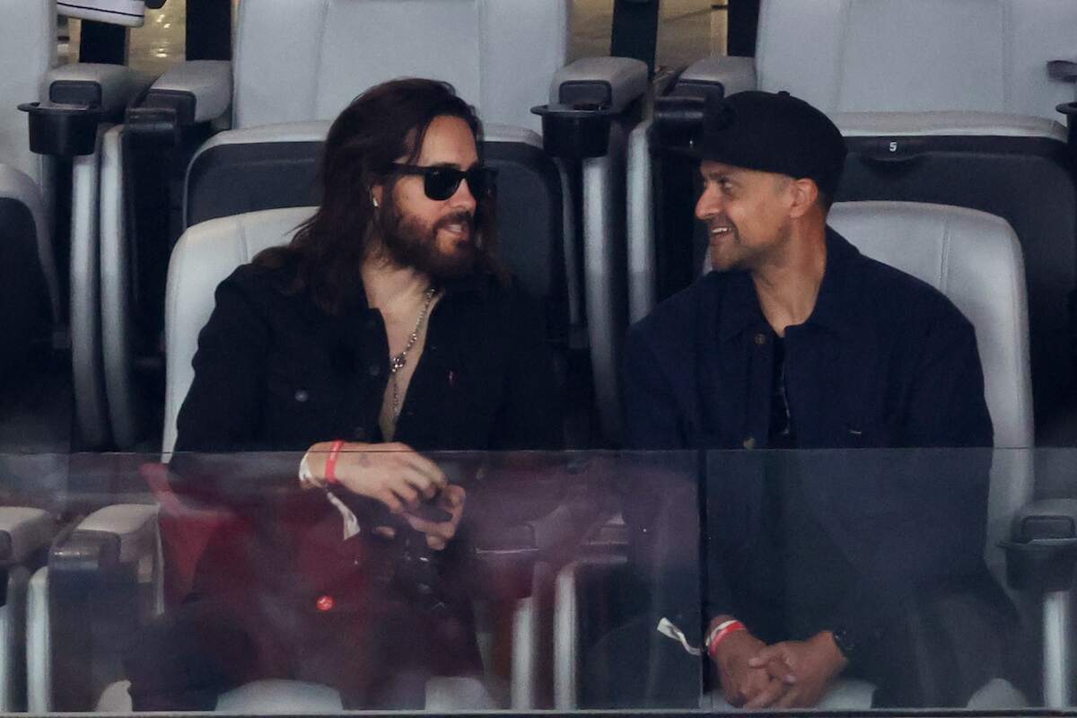 Singer/actor Jared Leto talks while seated at Super Bowl LVIII