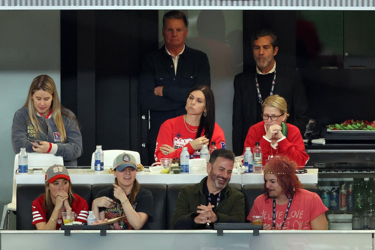 TV host Jimmy Kimmel and comedian Carrot Top laugh during Super Bowl LVIII