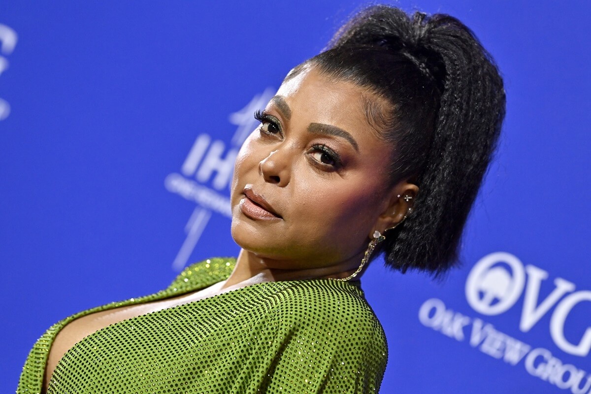 Taraji P. Henson posing at the the 2024 Palm Springs International Film Festival Film Awards in a green dress.