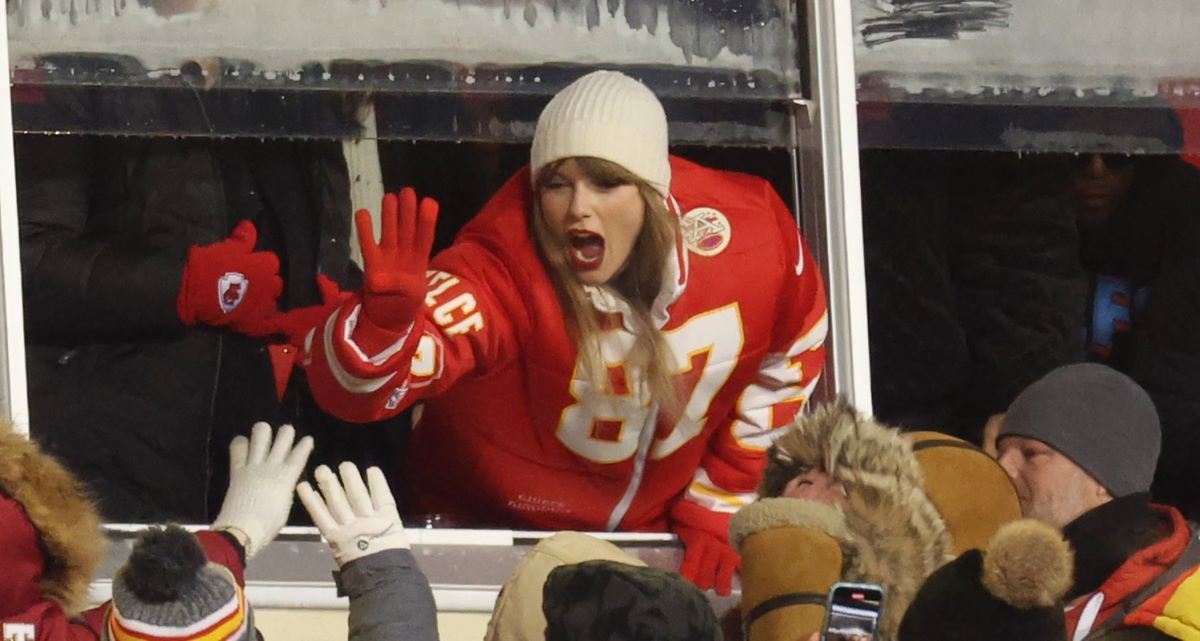 Taylor Swift celebrates with fans in KJ Designs custom-made Chiefs jacket