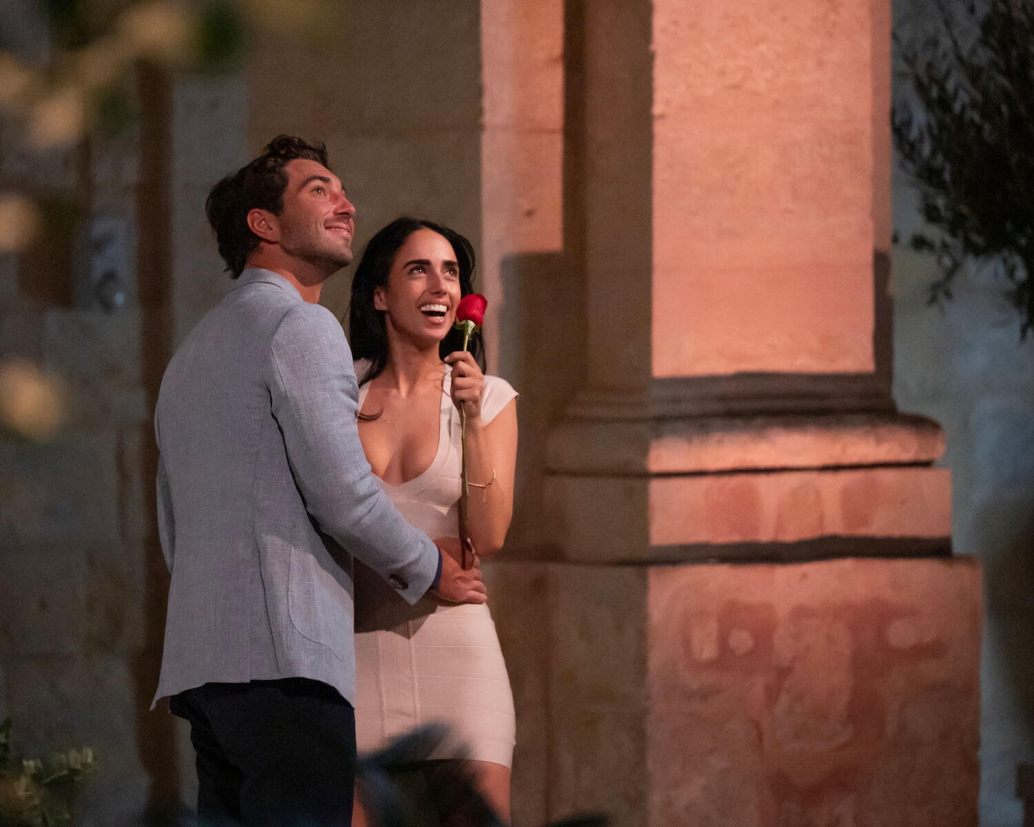 'The Bachelor' Season 28 star Joey Graziadei embracing Maria Georgas while she holds a rose