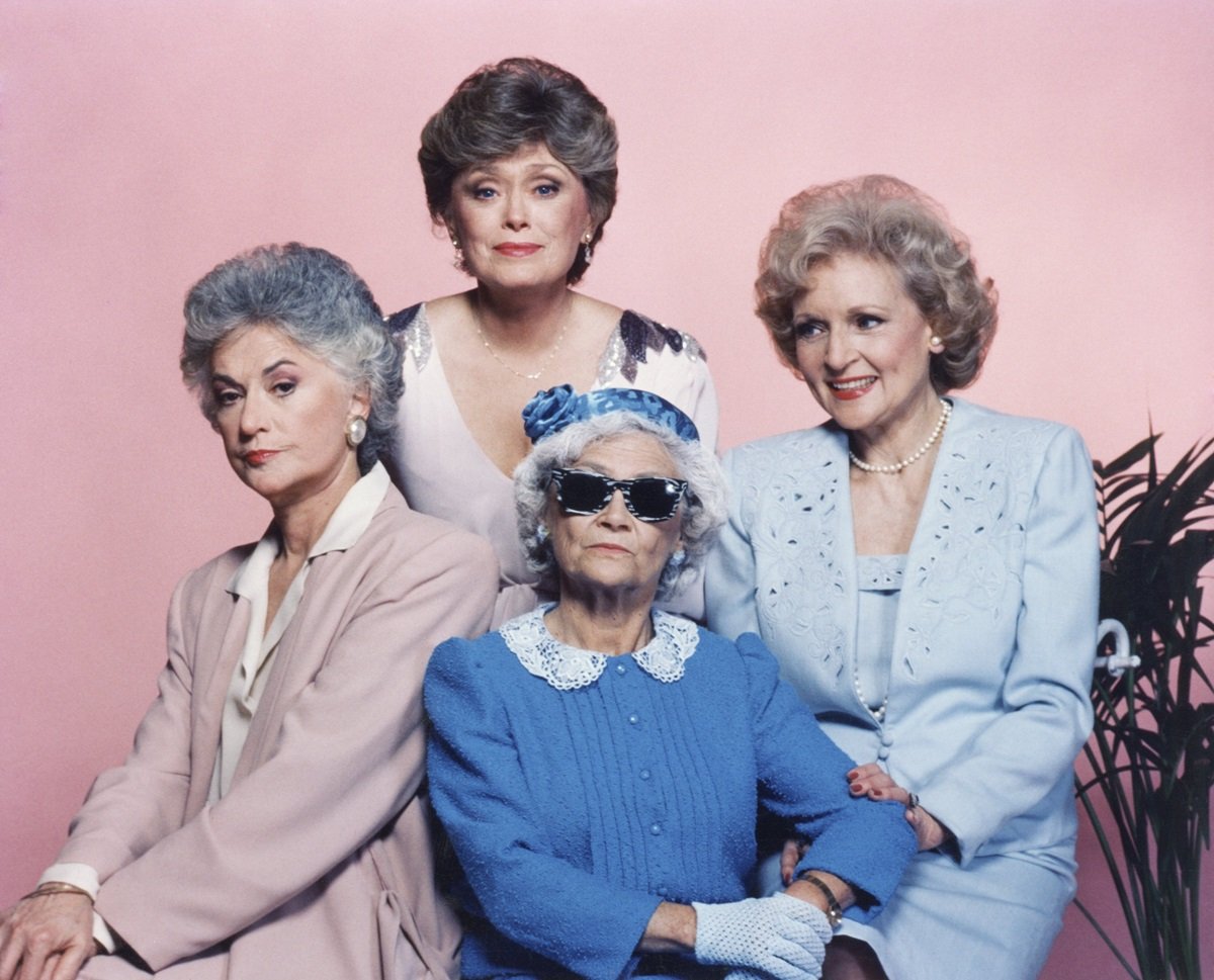 Bea Arthur as Dorothy Zbornak, Rue McClanahan as Blanche Devereaux, Estelle Getty as Sophia Petrillo and Betty White as Rose Nylund in a promotional photo for 'The Golden Girls'
