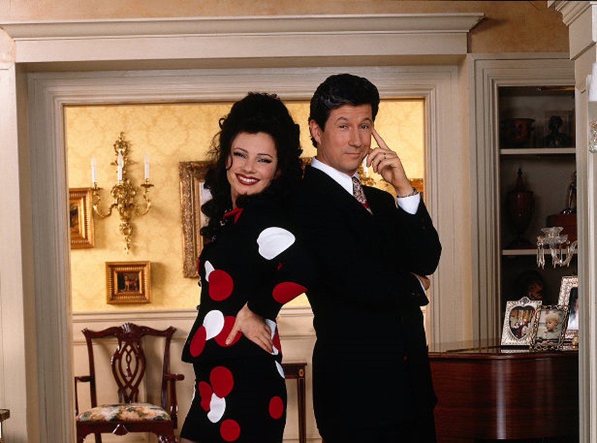 Fran Drescher as Nanny Fine and Charles Shaughnessy as Maxwell Sheffield pose together in the Sheffield family mansion.