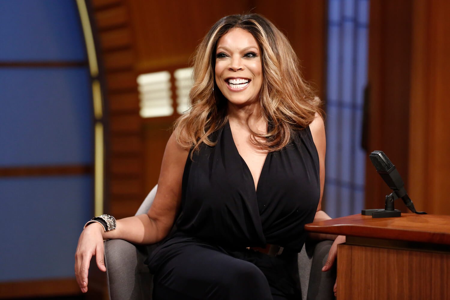 Wendy Williams smiling on a talk show