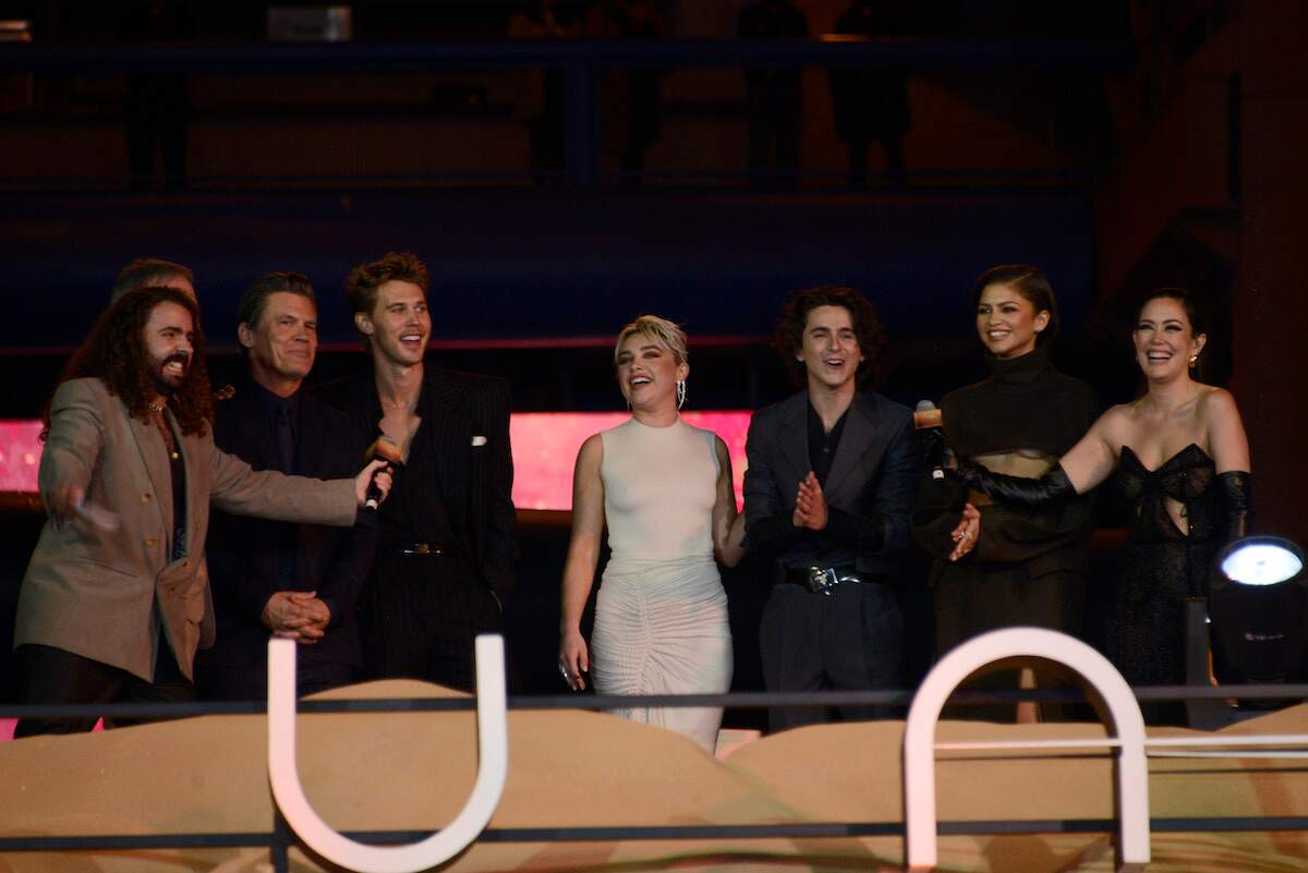 The Dune Part Two cast looks out at fans during the fan event