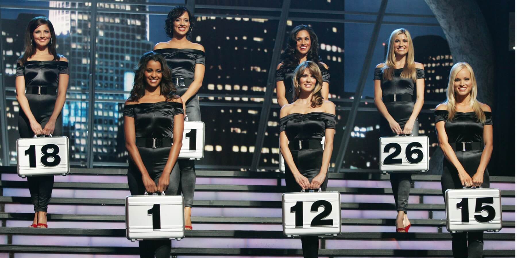 Claudia Jordan (1st row left) and Meghan Markle (3rd from left) appeared together on Season 2 of 'Deal or No Deal'