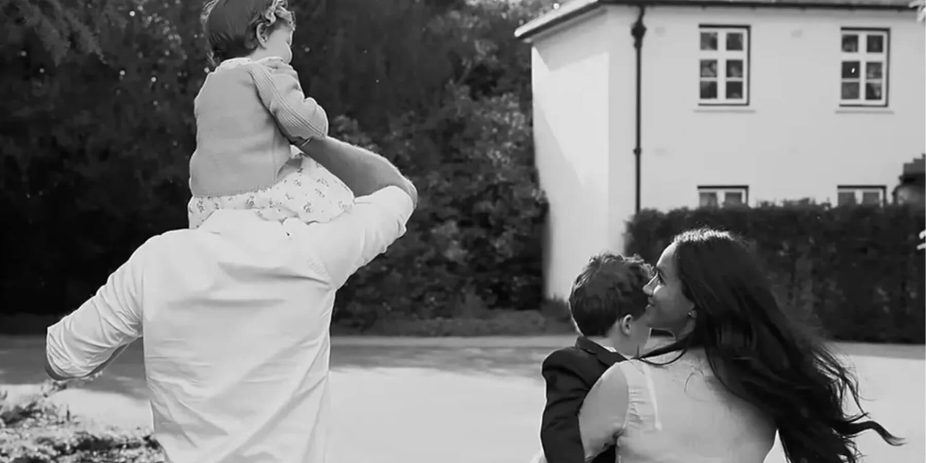 Prince Harry, Meghan Markle, Princess Lilibet and Prince Archie in a screenshot from Netflix's 'Harry and Meghan' docuseries
