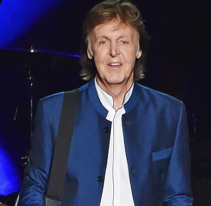 The Beatles' Paul McCartney wearing blue