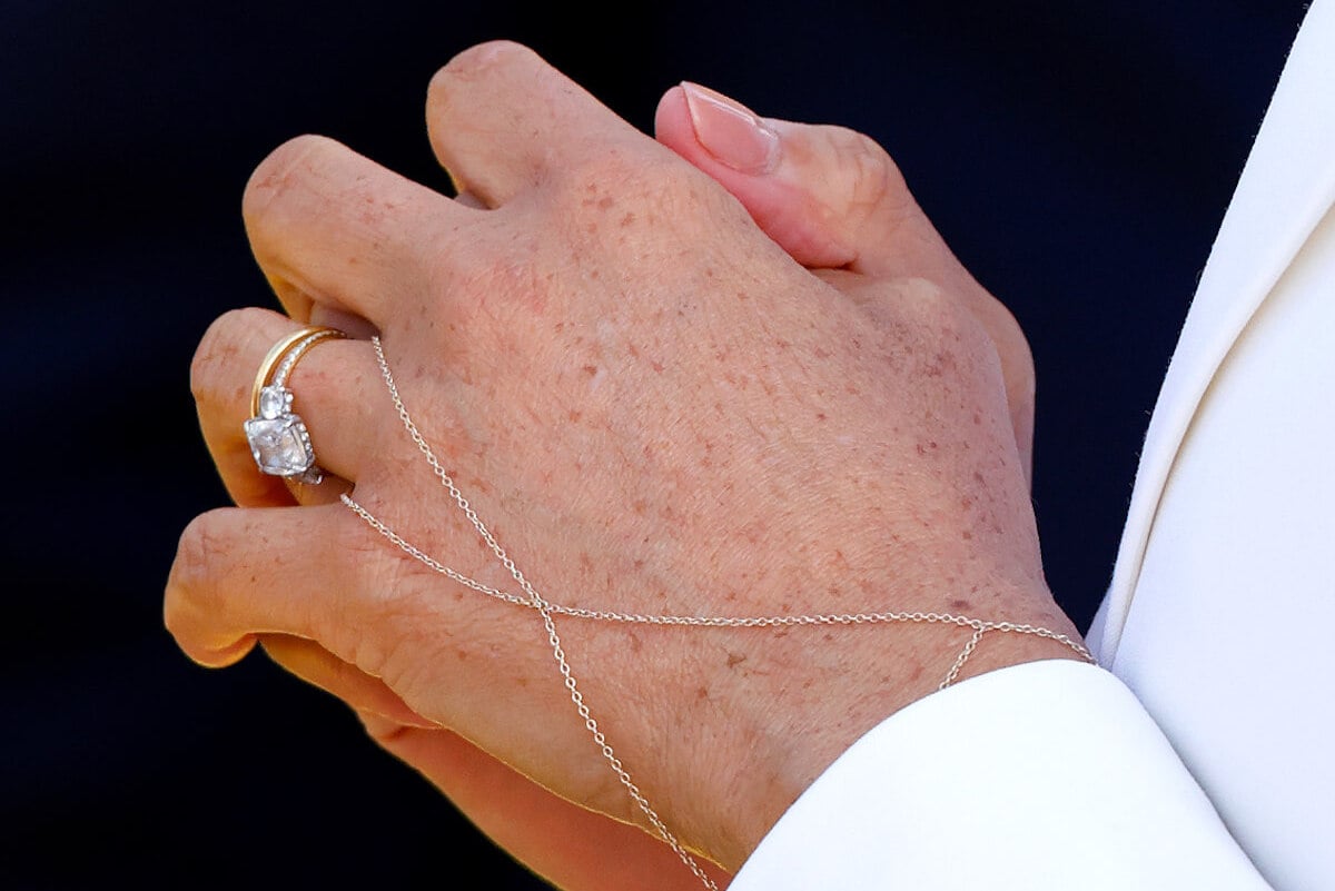 A close-up of Meghan Markle's hand and her engagement ring, which has been named the most 'iconic' royal engagement ring of 2023