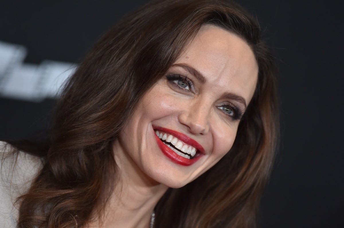 Angelina Jolie posing at the 21st Annual Hollywood Film Awards.