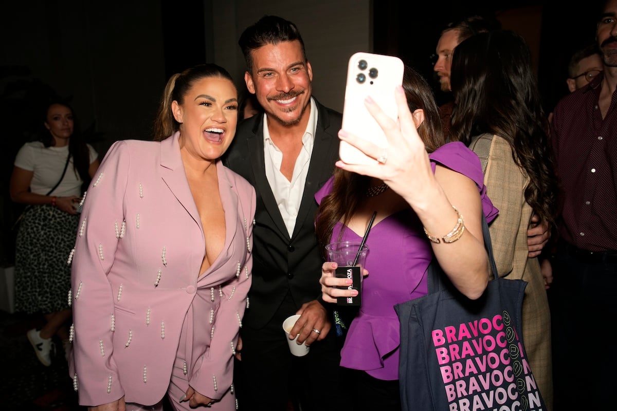 Brittany Cartwright and Jax Taylor take a selfie with a fan