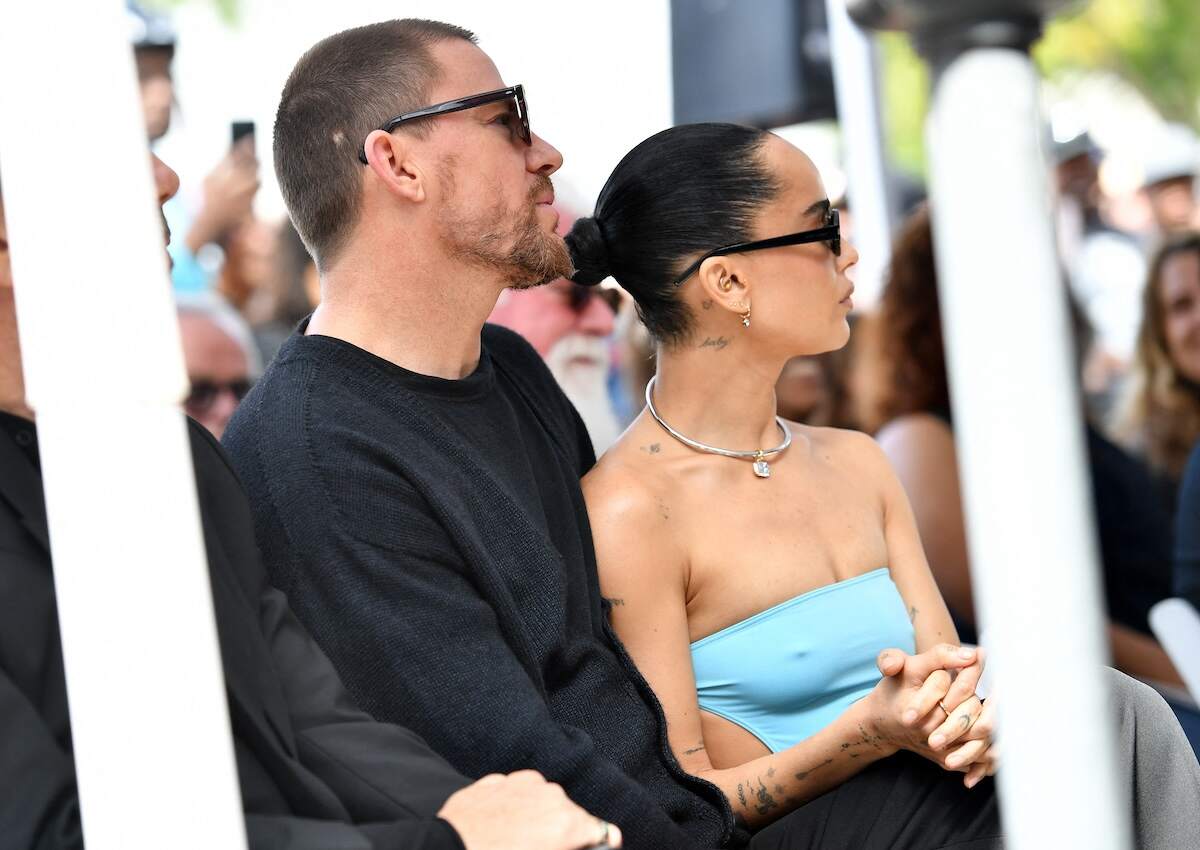 Actors Channing Tatum and Zoë Kravitz listen from the front row during Lenny Kravitz's Walk of Fame ceremony