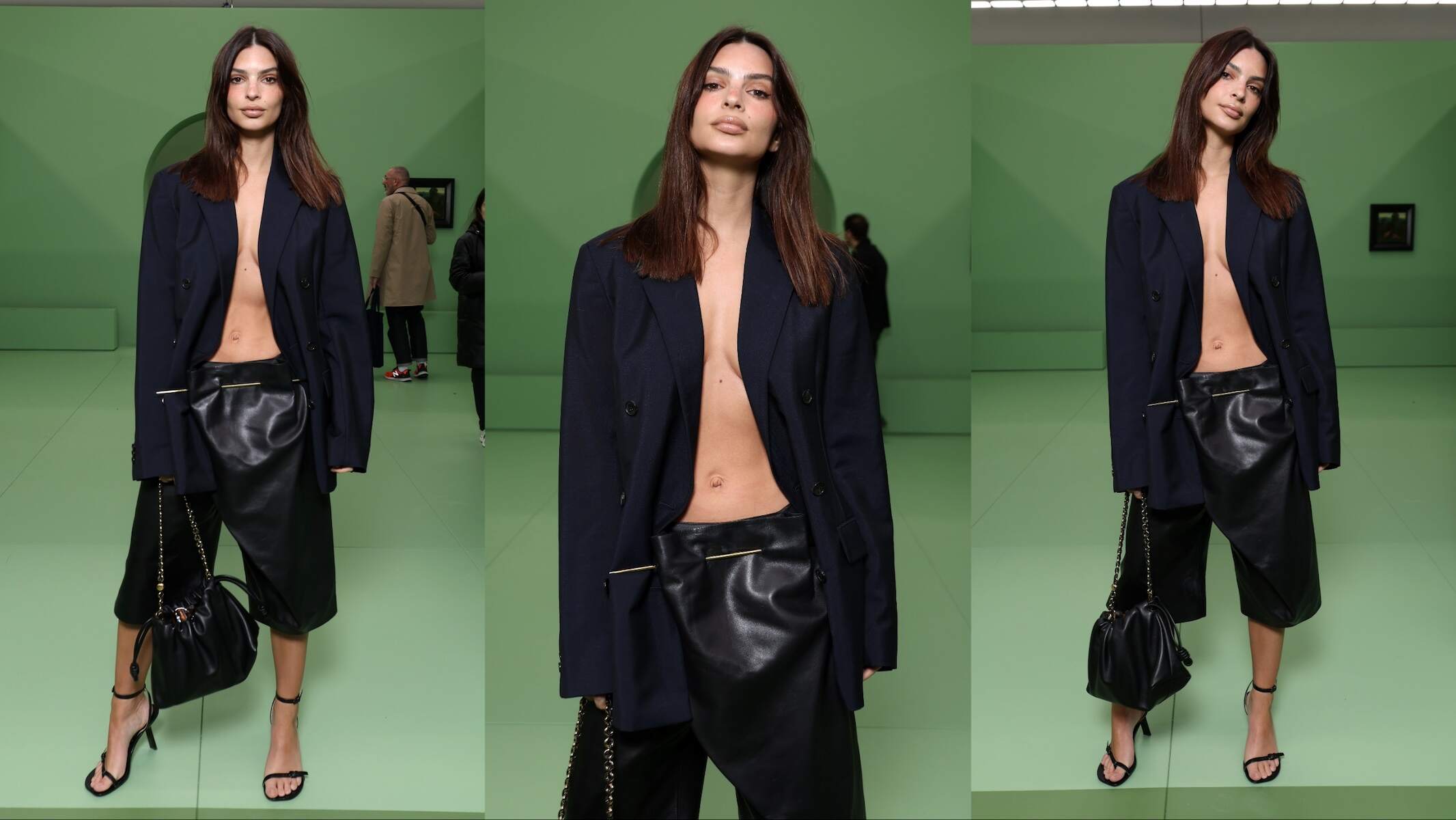 Model Emily Ratajkowski wears a blazer and large pants at Paris Fashion Week 2024