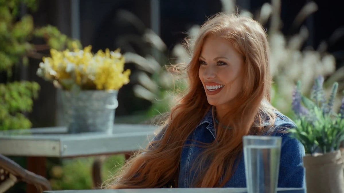 Smiling woman with red hair in 'Farmer Wants a Wife' Season 2