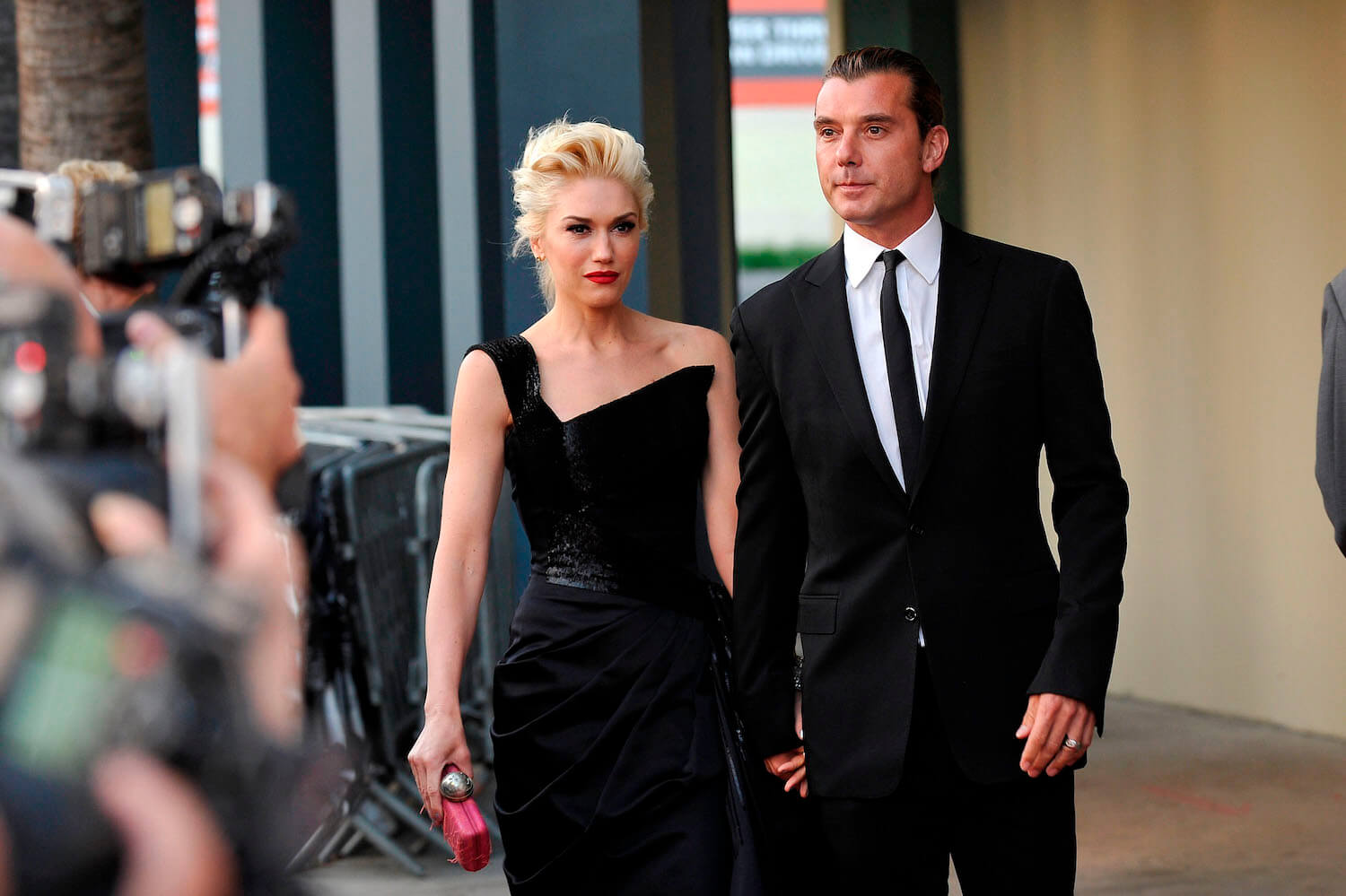 Gwen Stefani and Gavin Rossdale walking together in formalwear