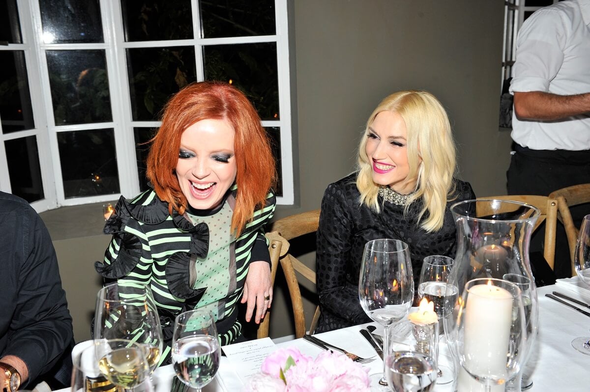 Gwen Stefani and Shirley Manson sitting down having dinner together.