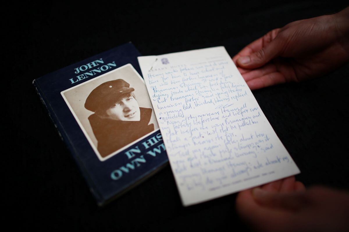A copy of John Lennon's 'In His Own Write' accompanied with a sheet of his handwritten prose.