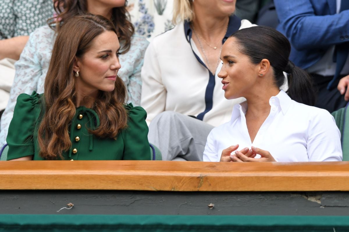 Kate Middleton and Meghan Markle in the Royal Box during the 2019 Wimbledon Tennis Championships