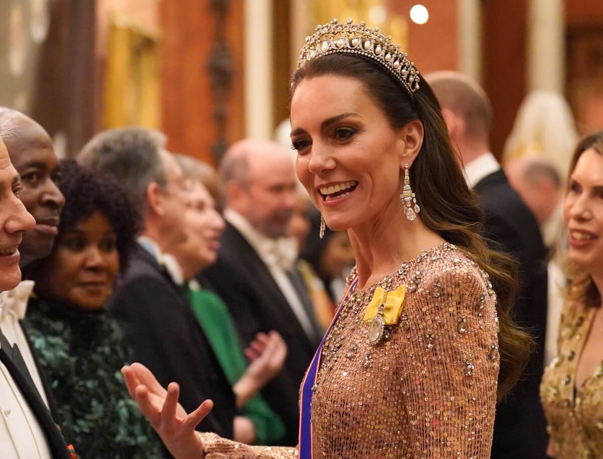 Kate Middleton attends an evening reception for members of the Diplomatic Corps at Buckingham Palace
