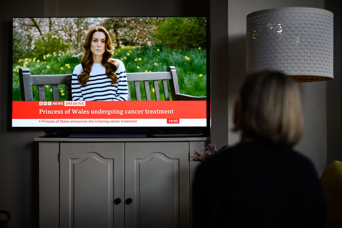 Kate Middleton is seen on a TV screen in a clip from her cancer diagnosis announcement video on March 22, 2024