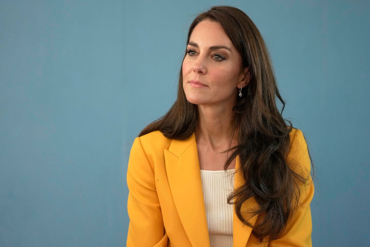 Kate Middleton, whose edited Mother's Day photo an expert traces back to a 'common' theme, in 2023 wearing a yellow blazer