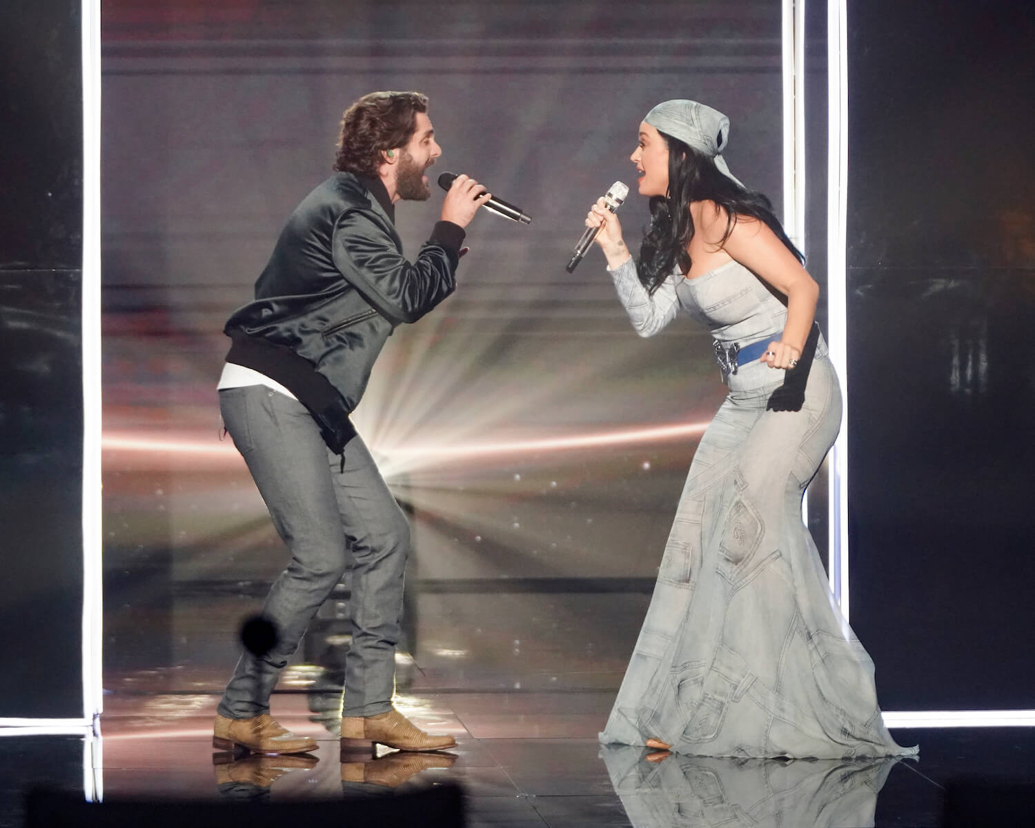 'American Idol' contestant Thomas Rhett from season 20 singing across from Katy Perry on stage