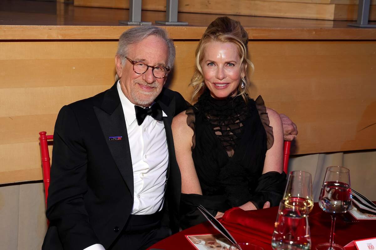 Steven Spielberg and Laurene Powell smile for a photo together wearing formalwear