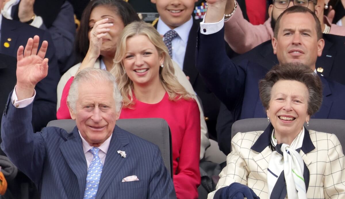 Lindsay Wallace, Peter Phillips, sitting in the second row behind King Charles III and Princess Anne at the Platinum Pageant