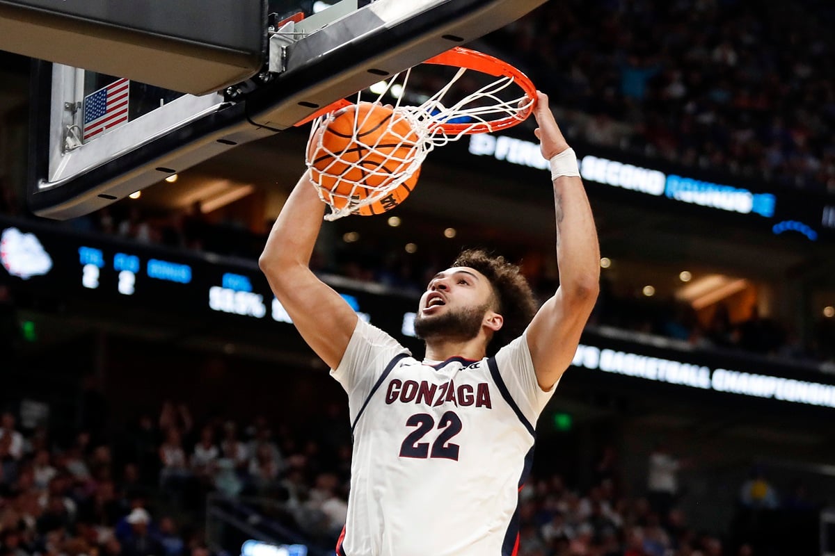   Anton Watson #22 of the Gonzaga Bulldogs dunks the ball against the McNeese State Cowboys second half in the first round of the NCAA Men's Basketball Tournament at Delta Center on March 21, 2024 in Salt Lake City, Utah