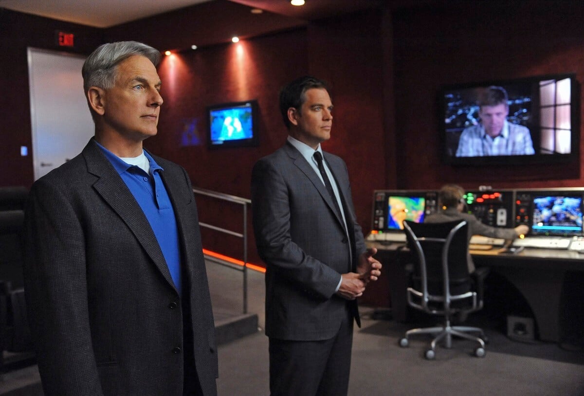 Mark Harmon standing next to Michael Weatherly in an episode of 'NCIS'.