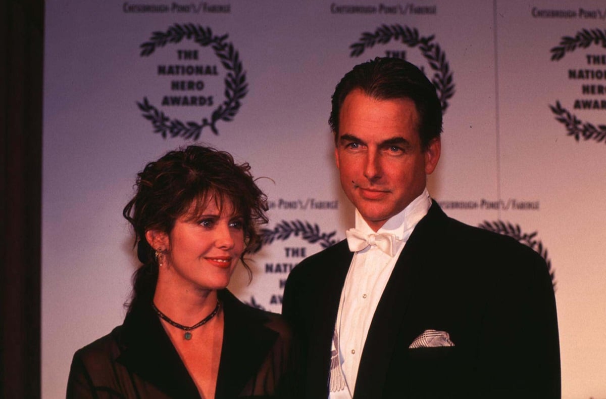 Pam Dawber posing alongside Mark Harmon at the National Hero Awards.
