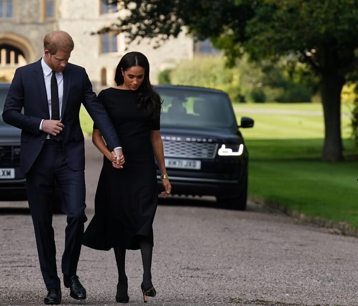 Prince Harry and Meghan Markle headed to greet mourners on the long Walk at Windsor Castle