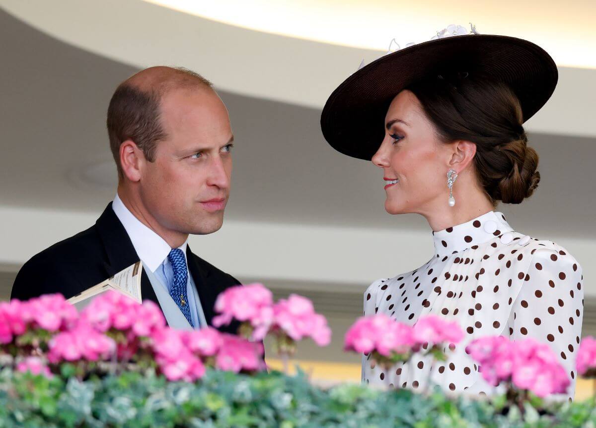 Prince William and Kate Middleton watch the racing from the Royal Box as they attend day 4 of Royal Ascot