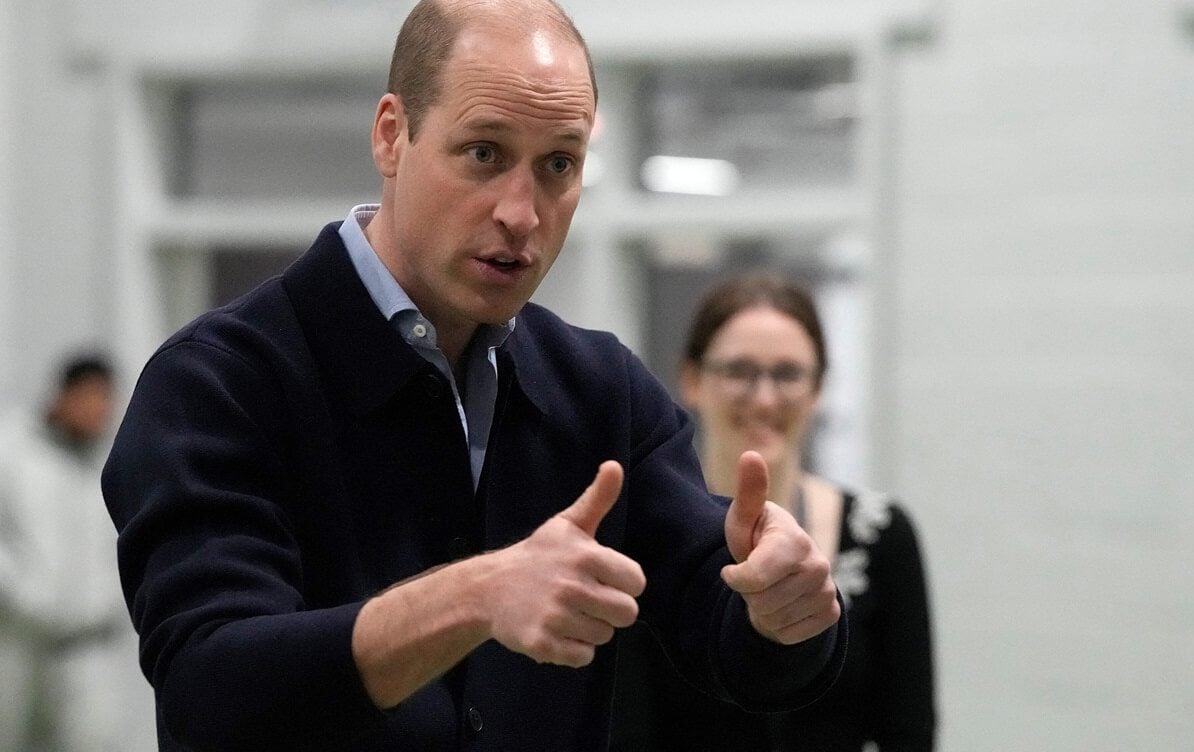 Prince William speaks to young people during a visit to WEST in London