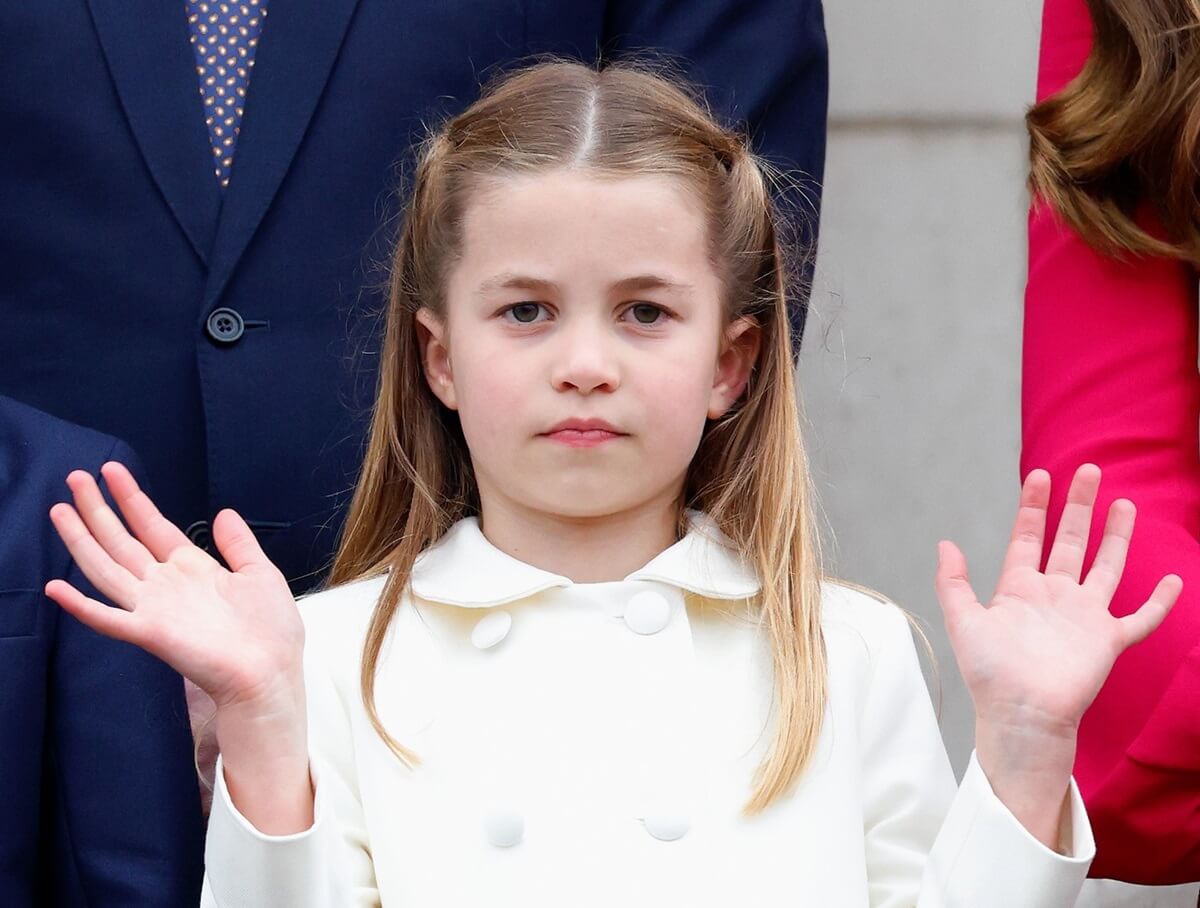 Princess Charlotte stands on the balcony of Buckingham Palace following the Platinum Pageant