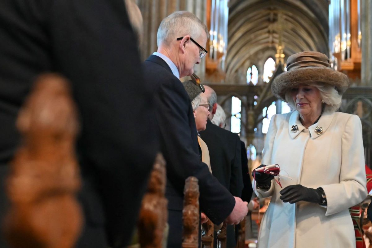 Queen Camilla hands out the Maundy Money during the Royal Maundy Service where she distributes the money to 75 men and 75 women, mirroring the age of the monarch