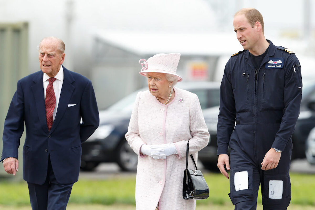 Queen Elizabeth, who always requested an extra cup and saucer before tea with Prince William, walks with Prince Philip and Prince William