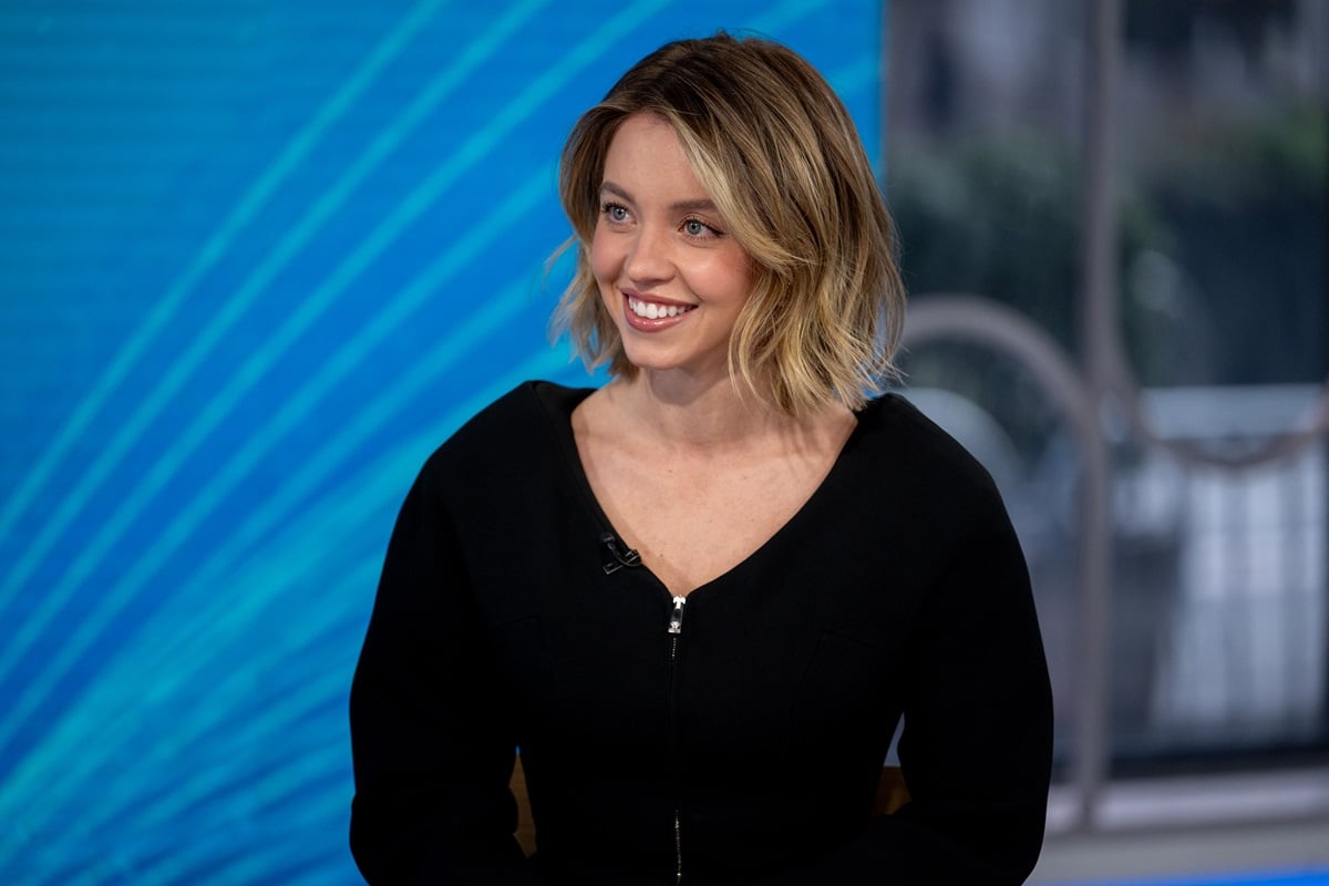 Sydney Sweeney posing on the Today show while wearing a black shirt.