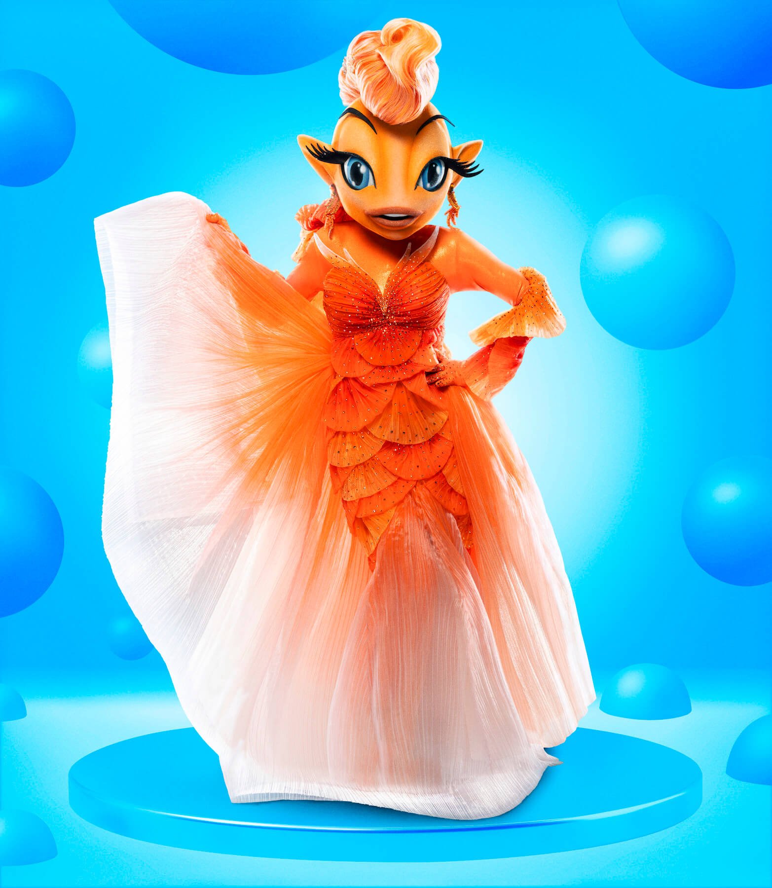 'The Masked Singer' Season 11 Group A singer Goldfish posing against a blue water background
