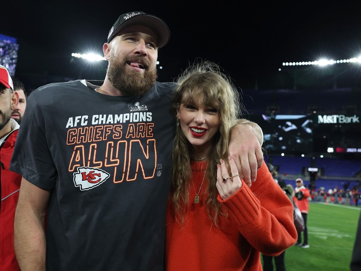 Travis Kelce celebrates with Taylor Swift after a victory against the Baltimore Ravens in the AFC Championship Game