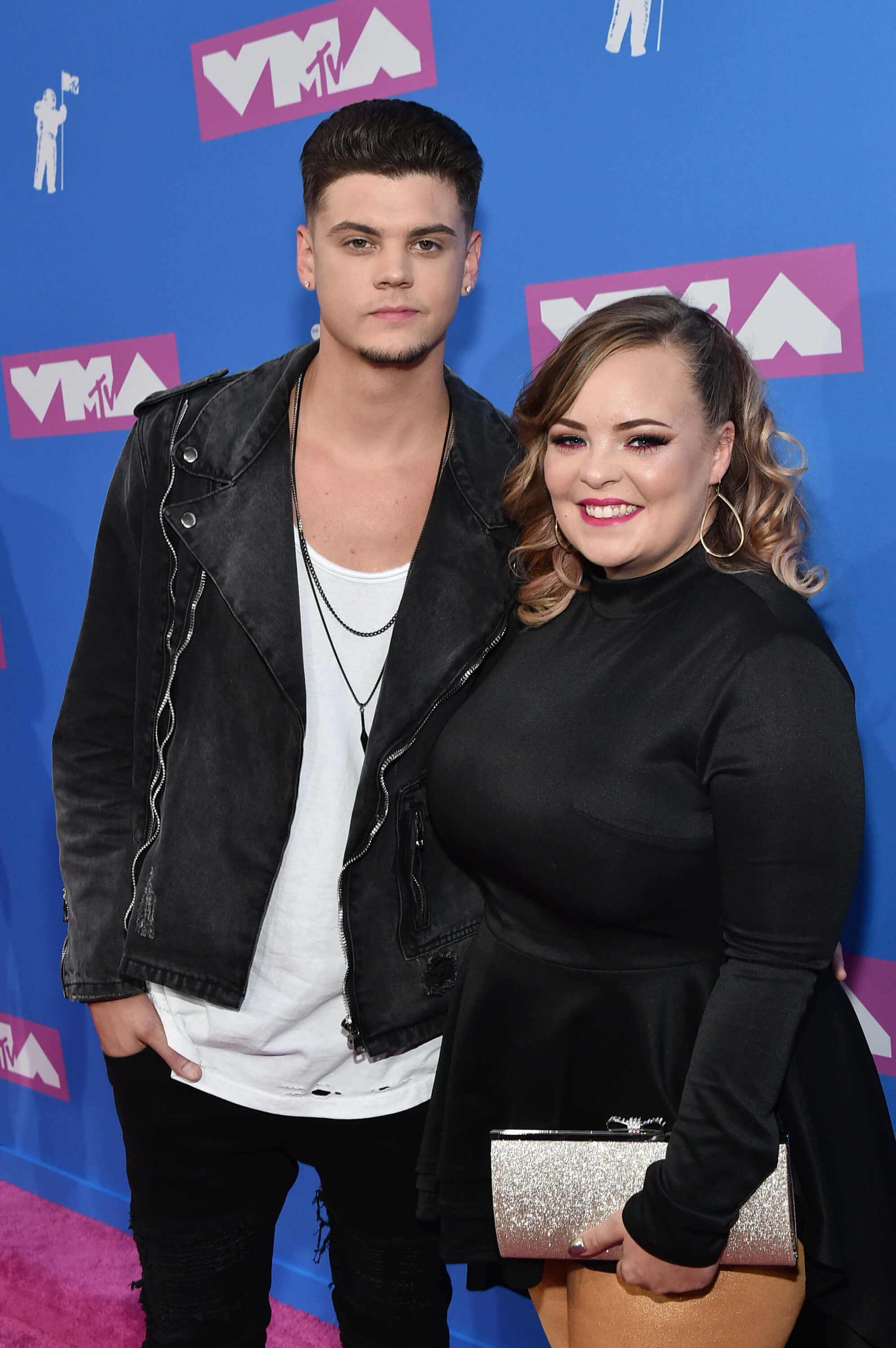 'Teen Mom' stars Tyler Baltierra and Catelynn Lowell standing next to each other and posing at the MTV VMAs
